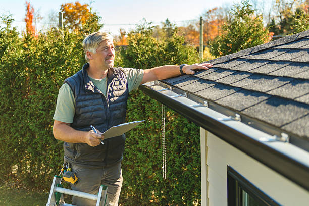 Professional Roofing technician working in Garnerville, NY